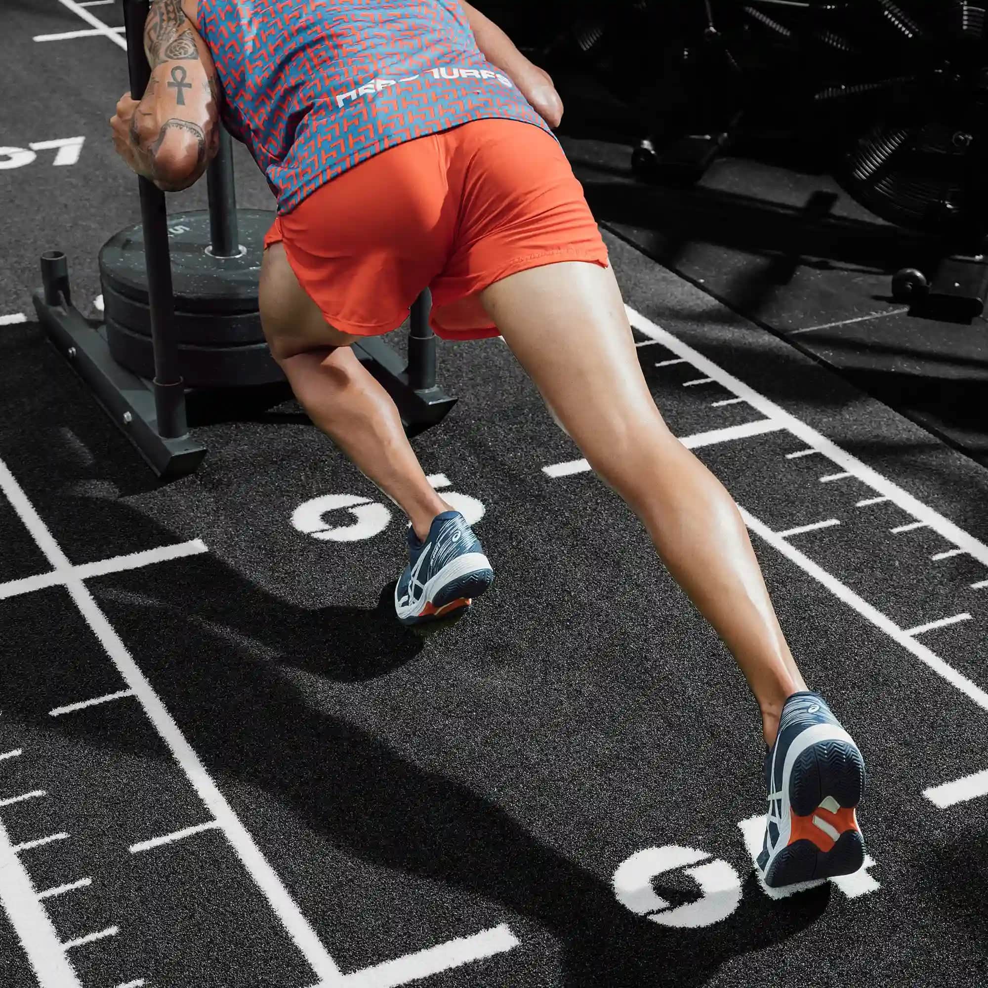 CrossFit box sled track with high-density artificial turf for intense workouts